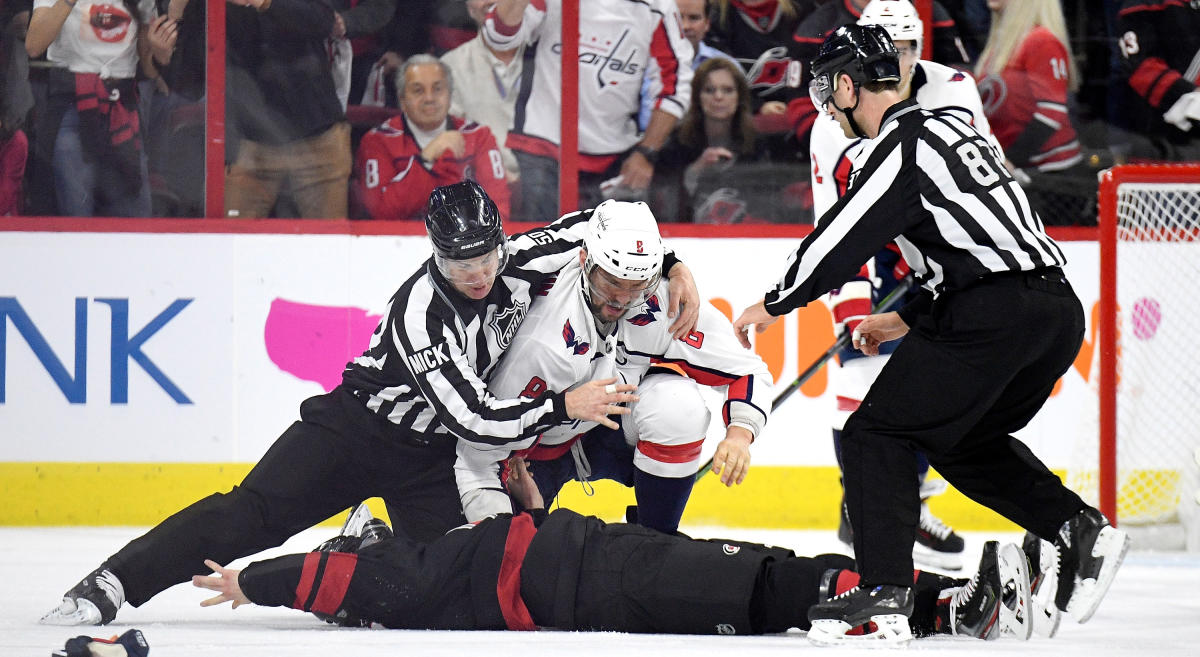 Capitals' Dowd takes Andrei Svechnikov's stick, throws it into crowd