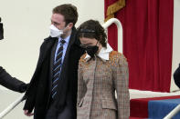 Cole and Ella Emhoff arrive during the 59th Presidential Inauguration at the U.S. Capitol in Washington, Wednesday, Jan. 20, 2021. (AP Photo/Andrew Harnik)