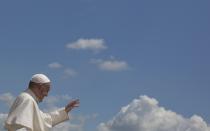 <p>Pope Francis waves to the faithful as he leaves St. Peter’s Square at the Vatican after his weekly general audience , May 10, 2017. (Photo: Alessandra Tarantino/AP) </p>