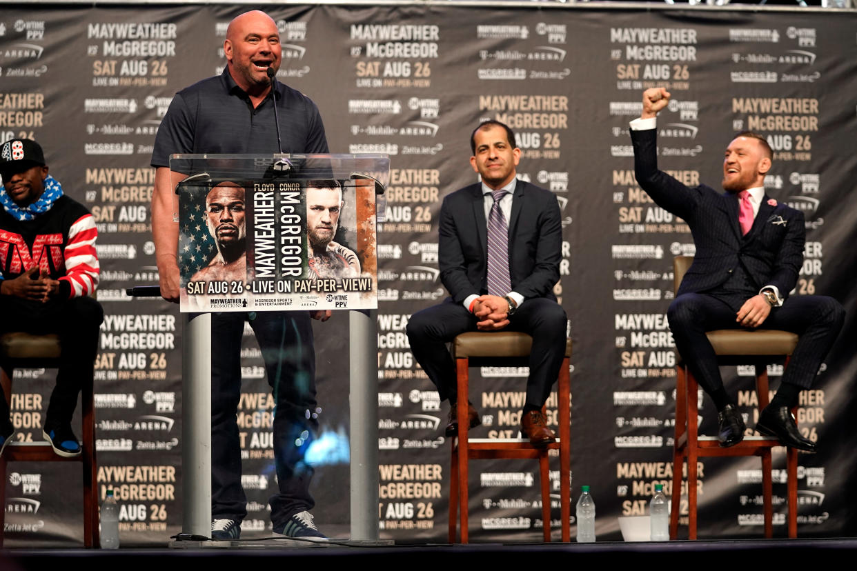 LOS ANGELES, CA - JULY 11:  (L-R) UFC President Dana White introduces Conor McGregor during the Floyd Mayweather Jr. v Conor McGregor World Press Tour event at the Staples Center on July 11, 2017 in Los Angeles, California. (Photo by Jeff Bottari/Zuffa LLC/Zuffa LLC via Getty Images)