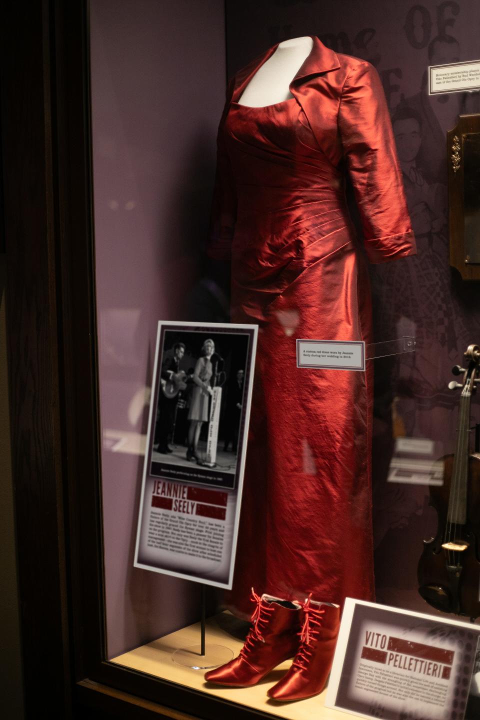 A red satin gown worn by Jeannie Seely on the Grand Ole Opry has been added to the Ryman Auditorium's exhibition honoring the Opry's "golden era."