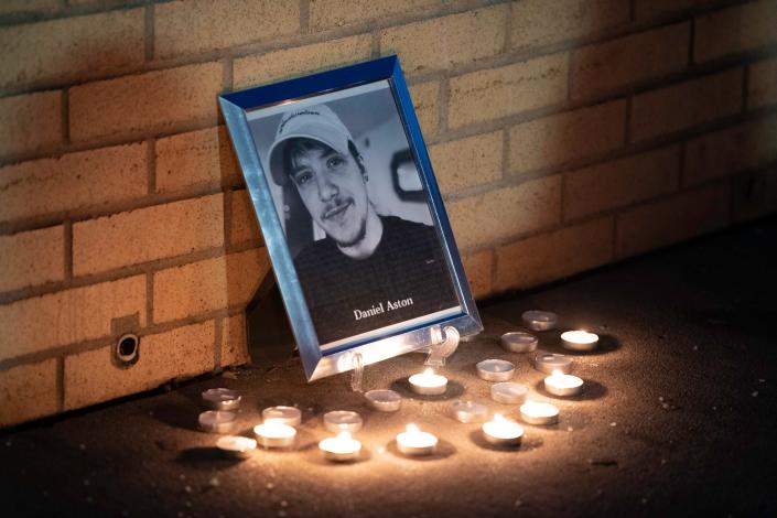 A photo of Daniel Aston during a memorial in Colorado Springs, Colo., on Monday.