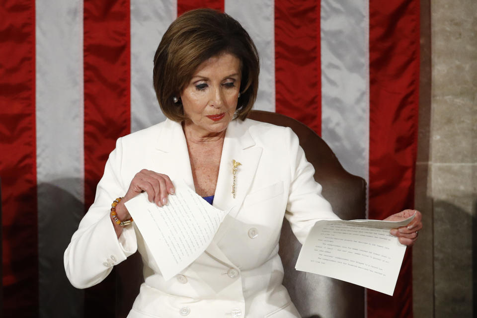 House Speaker Nancy Pelosi of Calif., tears her copy of President Donald Trump's s State of the Union address after he delivered it to a joint session of Congress on Capitol Hill in Washington, Tuesday, Feb. 4, 2020. (AP Photo/Patrick Semansky)