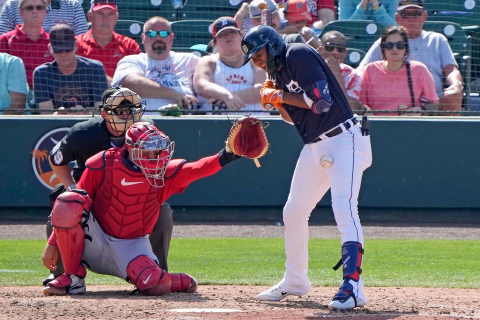 Detroit Tigers' Jermaine Palacios is hit by a pitch in the fifth inning during a spring training baseball game against the St. Louis Cardinals at Publix Field at Joker Marchant Stadium in Lakeland, Florida, on Tuesday, March 7, 2023.