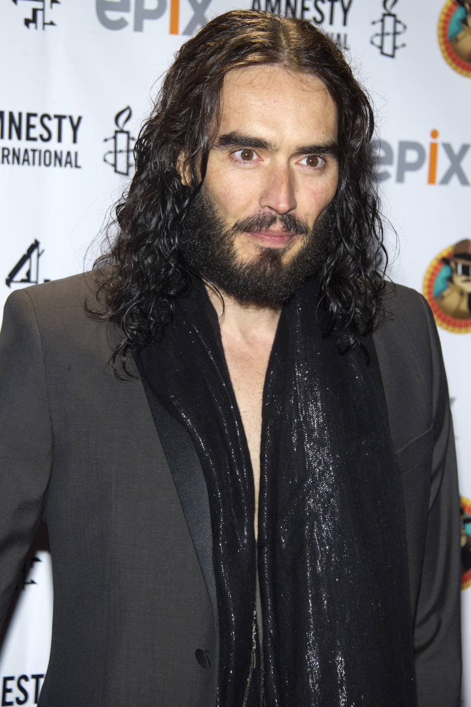 FILE - In this March 4, 2012 file photo, Russell Brand arrives to Amnesty International's "Secret Policeman's Ball" in New York. MTV network says the 36-year-old comedian will host the 2012 MTV Movie Awards June 3, 2012. (AP Photo/Charles Sykes, file)