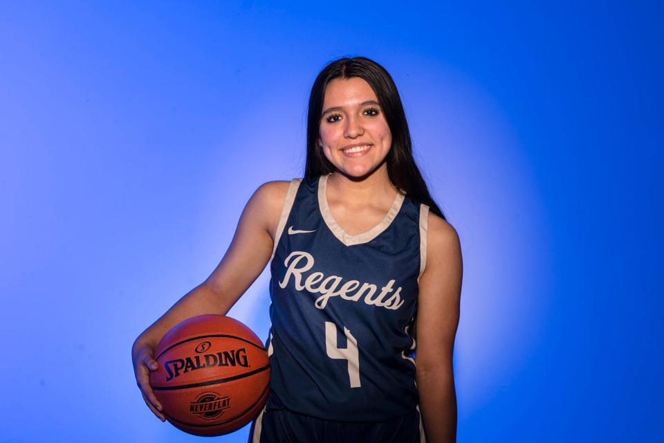 Analisa Taylor of the Regents basketball team hopes to visit Spain to learn more about her heritage. Before games, she visualizes the goals she hopes to meet.