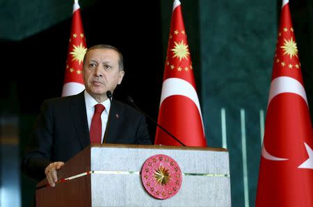 Turkey's President Tayyip Erdogan addresses the audience during a meeting in Ankara, Turkey, January 12, 2016. REUTERS/Kayhan Ozer/Presidential Palace Press Office/Handout via Reuters