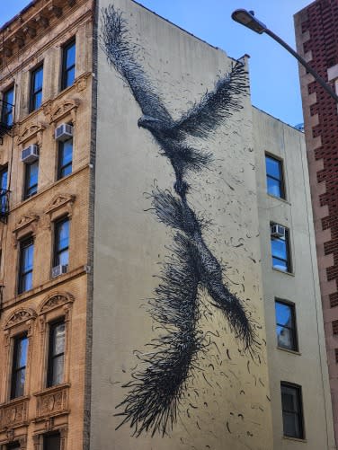 Close-up of graffiti art on NYC building.