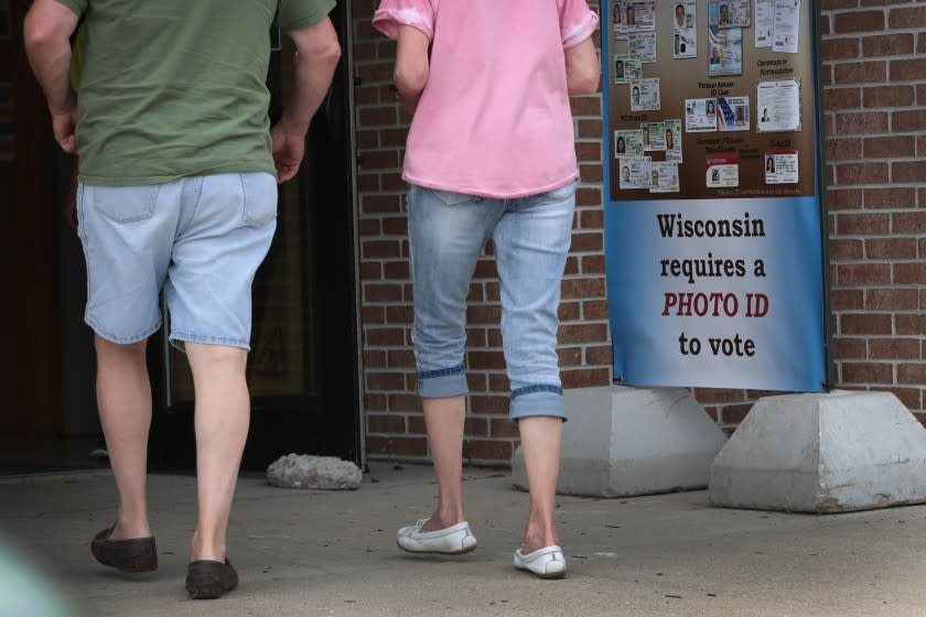 Voters Go To The Polls In Wisconsin's Primary Elections