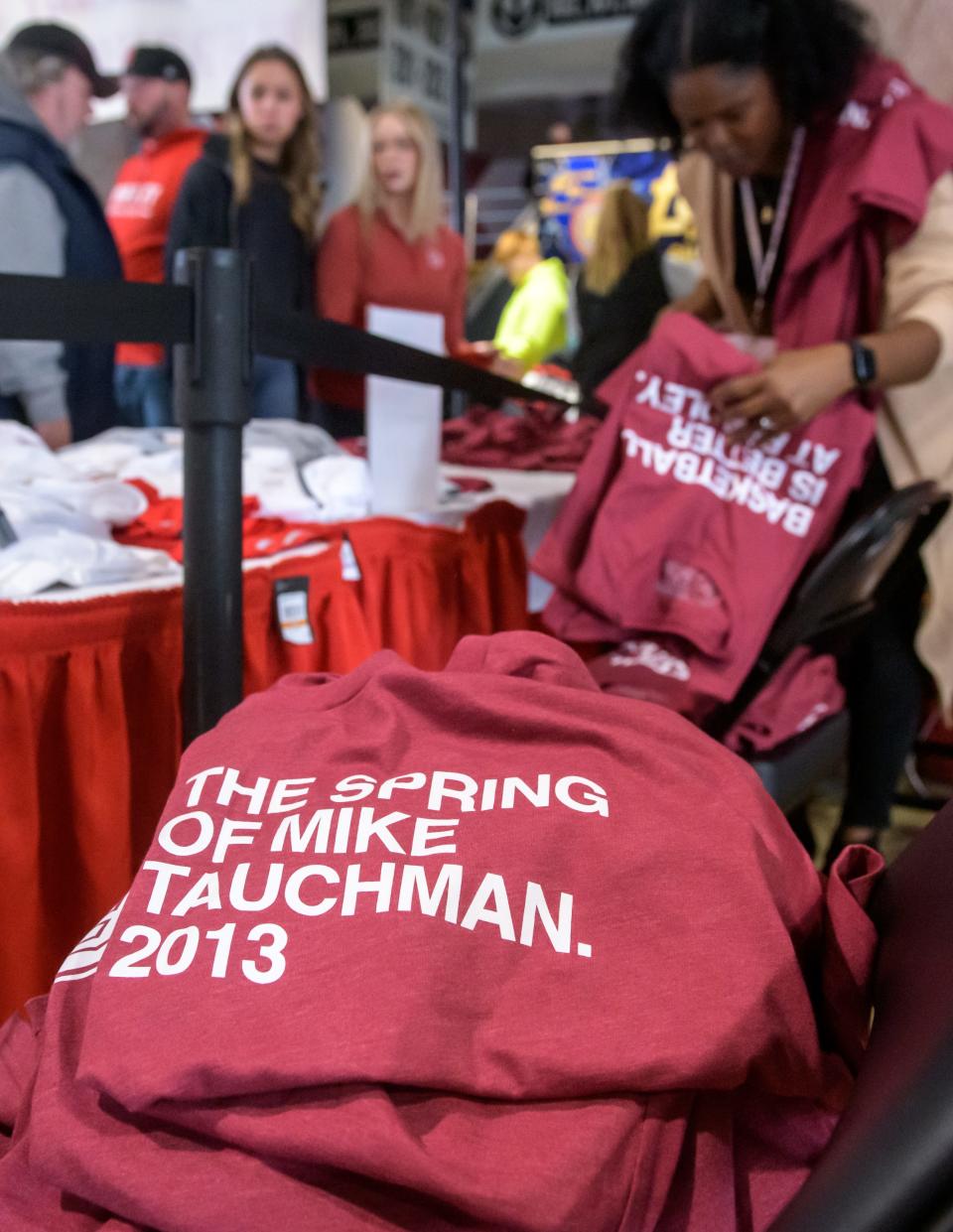 T-shirts from Obvious Shirts celebrating Chicago Cubs outfield and Bradley alum Mike Tauchman are for sale at a merchandise table during a Missouri Valley Conference basketball game between Bradley and Belmont on Saturday, Jan. 20, 2024 at Carver Arena in Peoria.