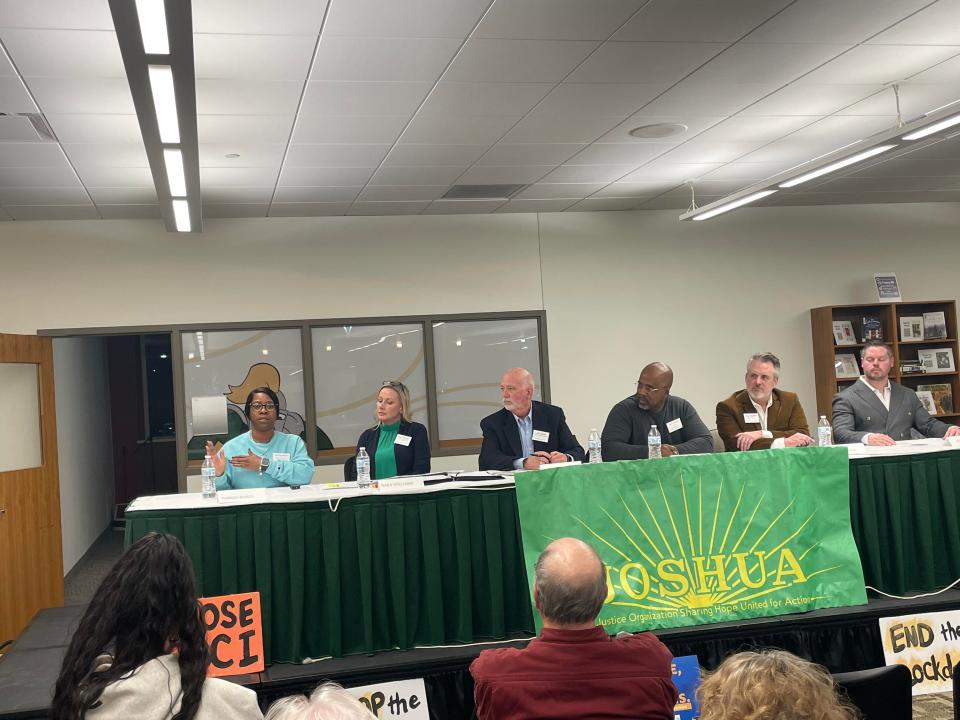 Four justice reform advocates and two elected officials take part in a community forum Thursday at the Mulva Library in De Pere to discuss closing Green Bay Correctional Institution. From left are Terressa Russell, Sara Williams, Allouez Village President Jim Rafter, Dant'e Cottingham, state Rep. Dave Steffen and Mark Rice.