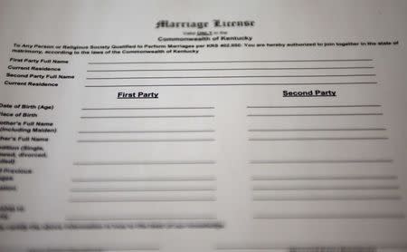 A copy of a new Kentucky marriage certificate application for same-sex couples, with "First Party" and "Second Party" replacing "Bride" and "Groom", is seen in Toronto September 3, 2015. REUTERS/Chris Helgren