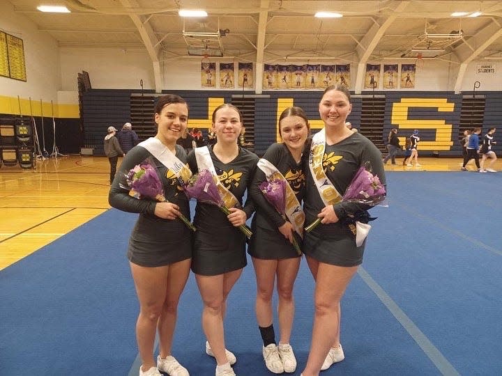 Hillsdale senior cheer members Lilly Macie, Cloey Easterday, Kaylynn Luke, and Brynn Bigelow helped their team win first place at the Hustle at the Hive tournament.