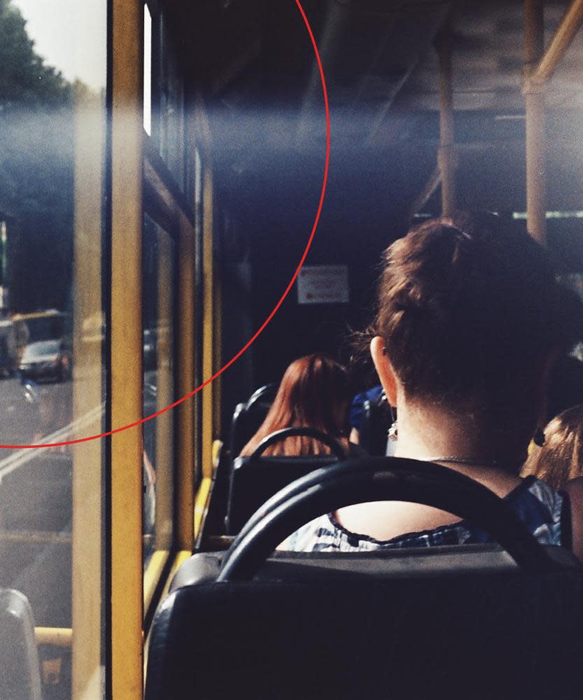 Rear view of bus passenger