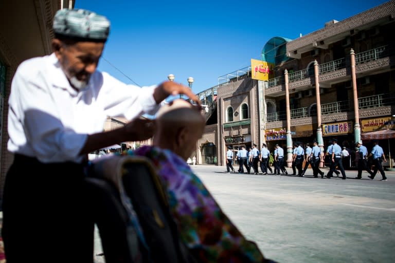 Public signs say no one is permitted to pray in public or grow a beard before the age of 50, while government employees are forbidden from fasting during Ramadan