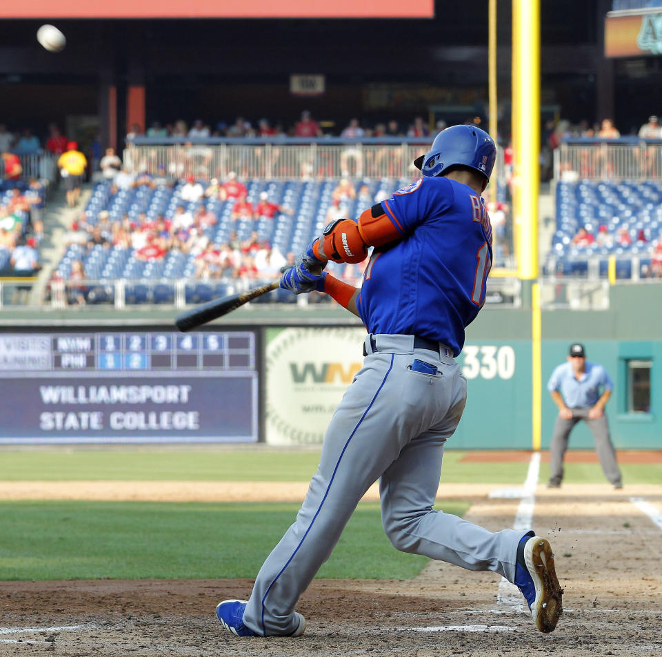 New York Mets' Jose Bautista connects for a grand slam during the fifth inning against the Philadelphia Phillies in a baseball game Thursday, Aug. 16, 2018, in Philadelphia. (AP Photo/Tom Mihalek)