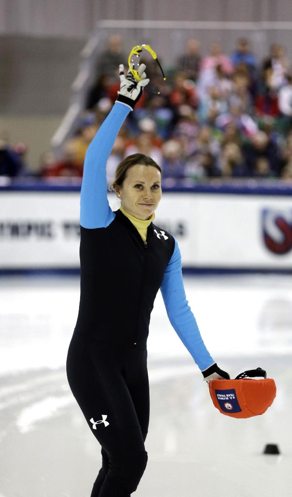Jessica Smith reacts to the crowd before her race in the women's 1,500 meters during the U.S. Olympic short track speedskating trials, Friday, Jan. 3, 2014, in Kearns, Utah. (AP Photo/Rick Bowmer)