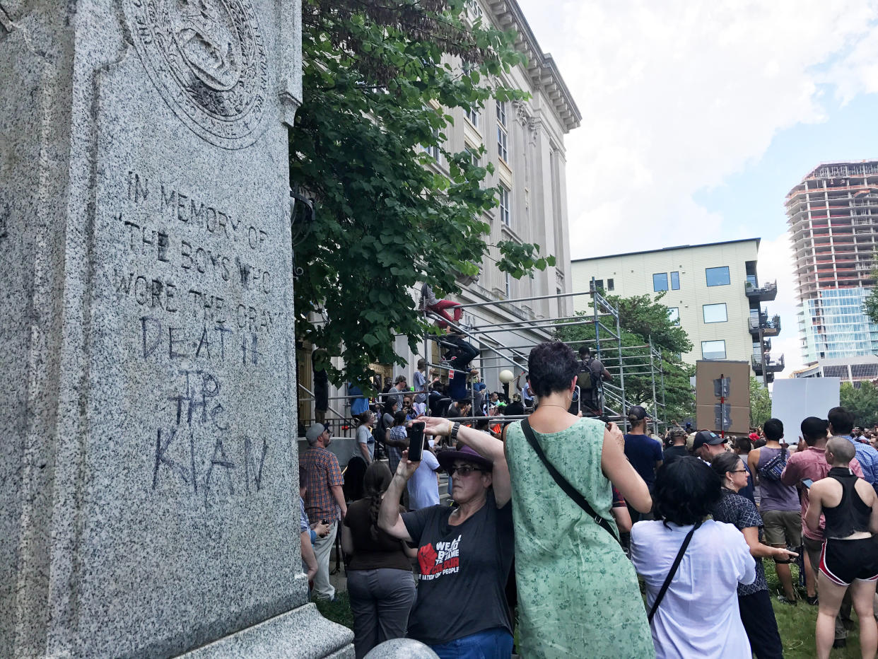 A vandalized Confederate monument&nbsp;reads "Death to the Klan"&nbsp;in Durham, North Carolina, on Friday afternoon. (Photo: Kate Sheppard/HuffPost)