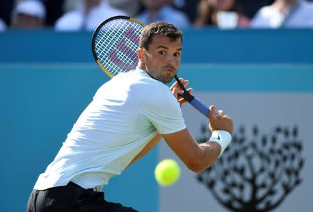 Tennis - ATP 500 - Fever-Tree Championships - The Queen's Club, London, Britain - June 21, 2018 Bulgaria's Grigor Dimitrov in action during his second round match against Serbia's Novak Djokovic Action Images via Reuters/Tony O'Brien