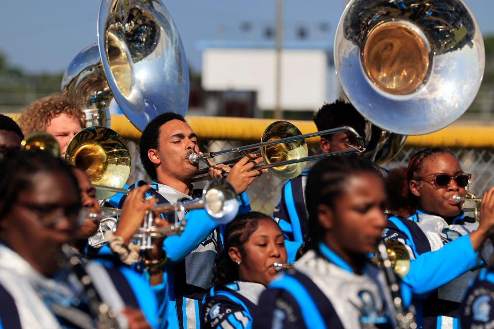 Sophomore Herbert Truehart plays the trombone during a groundbreaking celebration at Jean Ribault High School in Jacksonville. The 1957-vintage school is being replaced wth a new Ribault, which will be completed in 2025. Guests including state and local government officials joined students and Duval County school district employees for the groundbreaking Tuesday.
