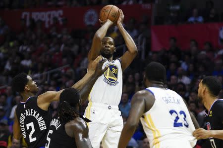 Apr 18, 2019; Los Angeles, CA, USA; Golden State Warriors forward Kevin Durant (35) attempts a shot during the second half against the Los Angeles Clippers in game three of the first round of the 2019 NBA Playoffs at Staples Center. Mandatory Credit: Kelvin Kuo-USA TODAY Sports