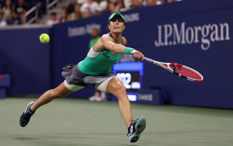 Alize Cornet of France in action against Emma Raducanu of Great Britain - Julian Finney/Getty Images