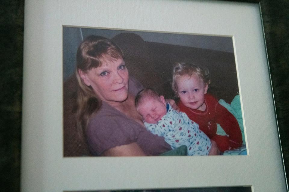 Cheri Leigh McDonald, the mother of Craig and Melissa, is pictured holding Craig and Melissa as children.