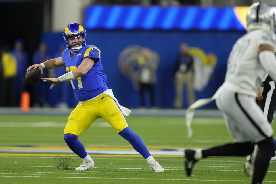 Los Angeles Rams quarterback Baker Mayfield throws a pass during the second half of an NFL football game against the Las Vegas Raiders, Thursday, Dec. 8, 2022, in Inglewood, Calif. (AP Photo/Marcio Jose Sanchez)