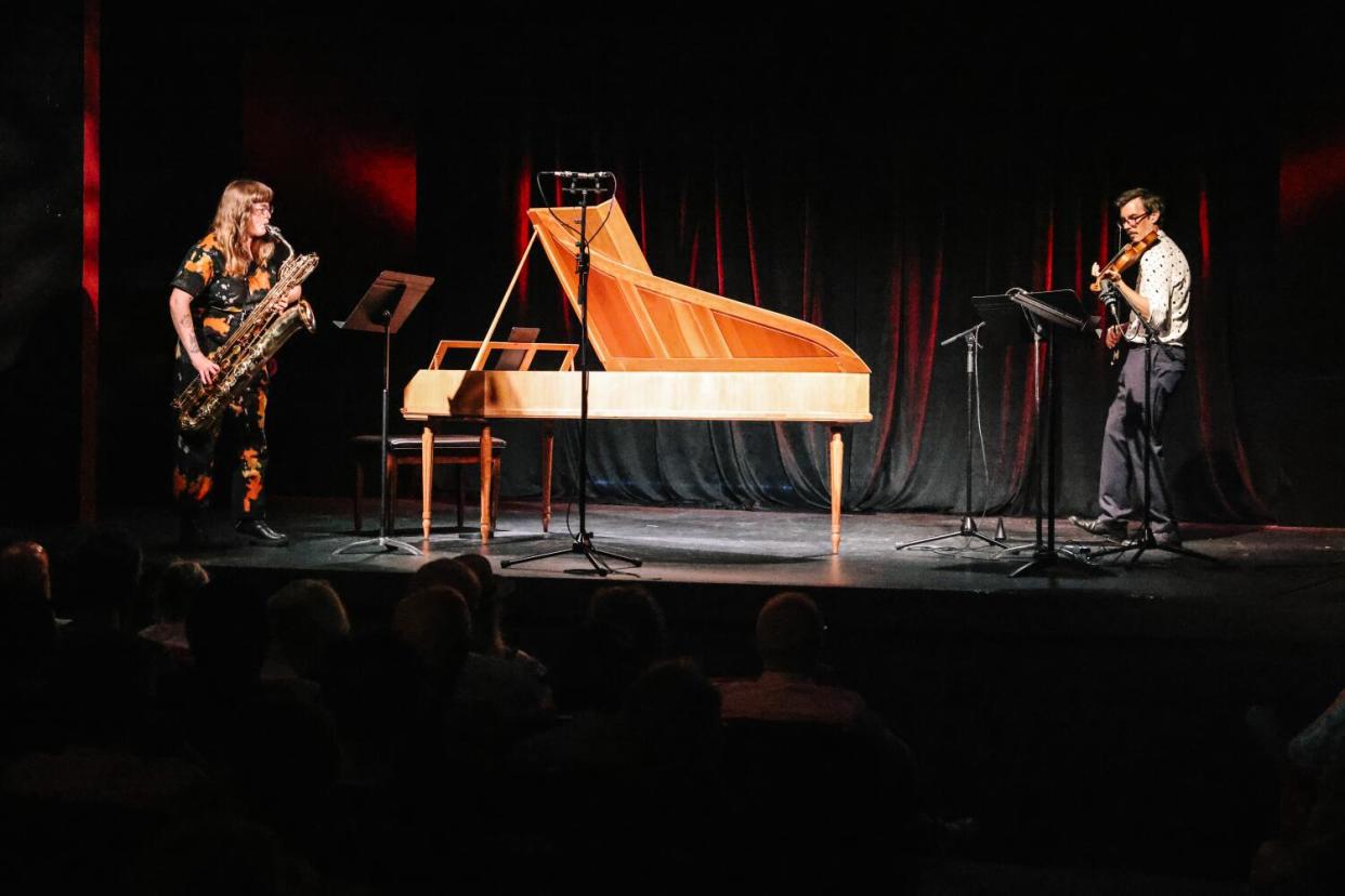 Marta Tiesenga and Andrew McIntosh performing onstage