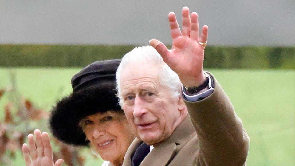 King Charles walking with Queen Camilla