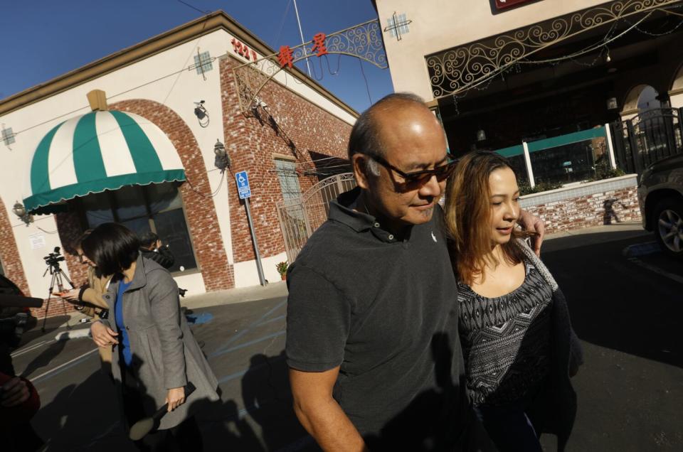 People at memorial for mass shooting victims in Monterey Park