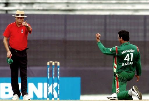 Bangladeshi bowler Abdur Razzak gestures towards umpire Nadir Shah (left) during a match against New Zealand at the Sher-e-Bangla stadium in Dhaka, 2008. Cricket authorities suspended six umpires at the centre of claims by an Indian television programme that they could be bribed to make favourable decisions during games