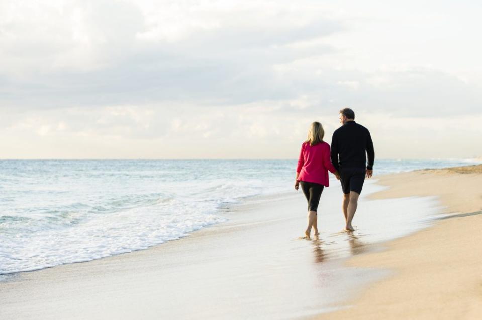 couple walking on beach