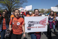 <p>Following the February shooting at a high school in Parkland, Fla., several hundred students march to a rally on the West Lawn of the Capitol to call for an end to gun violence in schools, in Washington, Friday, April 20, 2018, the 19th anniversary of the mass shooting in Littleton, Colo. (Photo: J. Scott Applewhite/AP) </p>