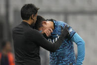 Tottenham's Son Heung-min receives treatment after taking a knock during the Champions League Group D soccer match between Marseille and Tottenham Hotspur at the Stade Velodrome in Marseille, France, Tuesday, Nov. 1, 2022. (AP Photo/Daniel Cole)