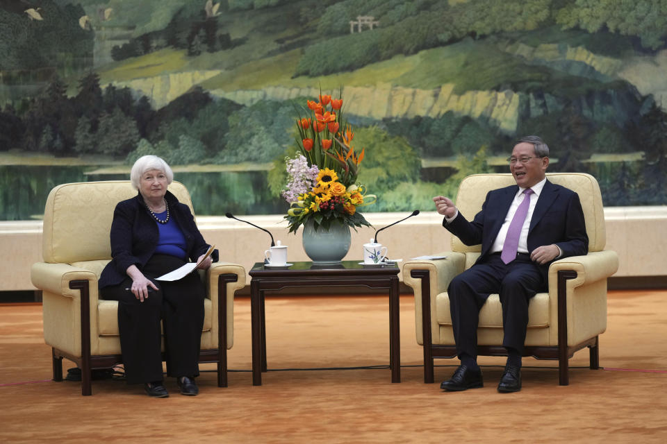 U.S. Treasury Secretary Janet Yellen, left, meets Chinese Premier Li Qiang at the Great Hall of the People in Beijing, China, Sunday, April 7, 2024. Yellen, who arrived later in Beijing after starting her five-day visit in one of China's major industrial and export hubs, said the talks would create a structure to hear each other's views and try to address American concerns about manufacturing overcapacity in China. (AP Photo/Tatan Syuflana, Pool)