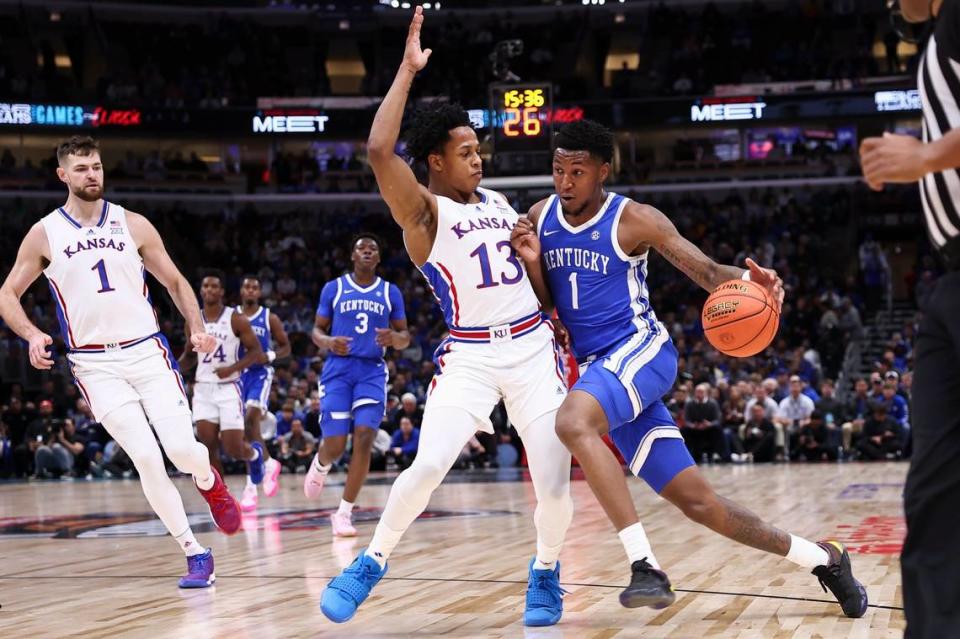 Kentucky’s Justin Edwards (1) dribbles against Kansas’ Charlie McCarthy (13) during the Champions Classic at the United Center in Chicago. Edwards finished with one point and four rebounds in 29 minutes.