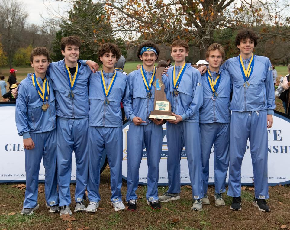 Salesianum poses for a photo after winning the DIAA 2022 Cross Country Boys Division I championship at Killens Pond State Park in Felton.