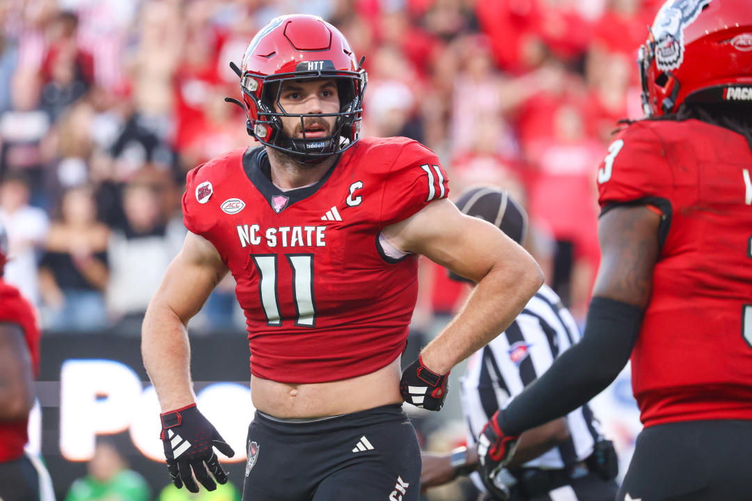 RALEIGH, NC - OCTOBER 07: North Carolina State Wolfpack linebacker Payton Wilson (11) talks with North Carolina State Wolfpack cornerback Aydan White (3) during the college football game between the North Carolina State Wolfpack and the Marshall Thundering Herd on October 7, 2023 at Carter-Finley Stadium in Raleigh, NC. (Photo by Nicholas Faulkner/Icon Sportswire via Getty Images)