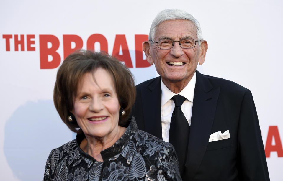 FILE - In this Sept. 17, 2015, file photo, Eli Broad, right, founder of The Broad museum, arrives with his wife Edythe at the museum's opening in Los Angeles. Eli Broad, the billionaire philanthropist, contemporary art collector and entrepreneur who co-founded homebuilding pioneer Kaufman and Broad Inc. and launched financial services giant SunAmerica Inc., died Friday, April 30, 2021 in Los Angeles. He was 87. (Photo by Chris Pizzello/Invision/AP, File)