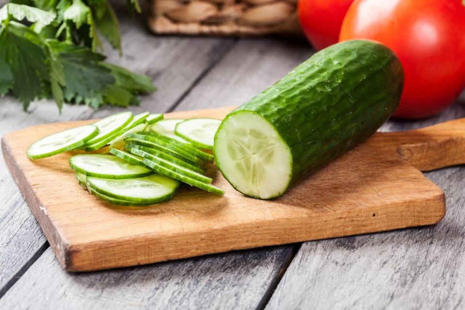 Cucumber on a wooden board