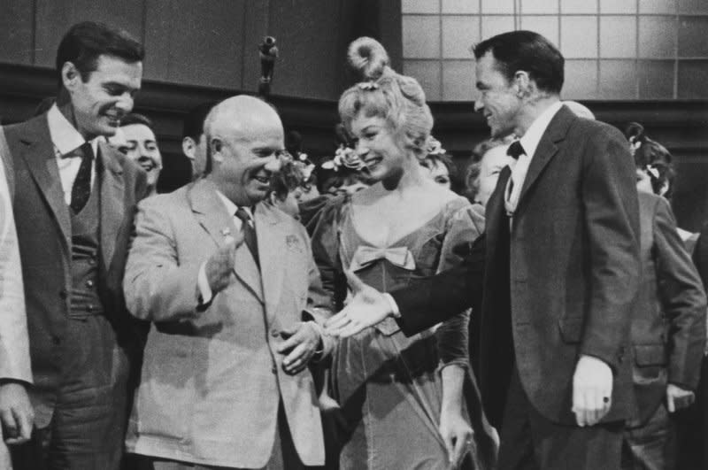 Frank Sinatra greets then Soviet Premier Nikita Khrushchev on the set of "Can Can" September 19, 1959, during Khrushchev's visiti to the United States. On September 15, 1959, Khrushchev became the first Soviet leader to visit the United States after saying he hoped to improve relations with Washington. UPI File Photo