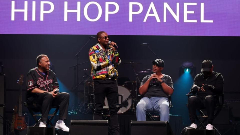 (Left to right) L. Londell McMillan, Doug E. Fresh, Tony M. and Chuck D speak onstage at Celebration 2023 on June 9 at Paisley Park in Chanhassen, Minnesota. (Photo by Kevin Mazur/Getty Images for Paisley Park)