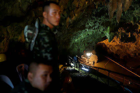 Soldiers and rescue workers work in Tham Luang cave complex, as an ongoing search for members of an under-16 soccer team and their coach continues, in the northern province of Chiang Rai, Thailand, July 1, 2018. REUTERS/Soe Zeya Tun