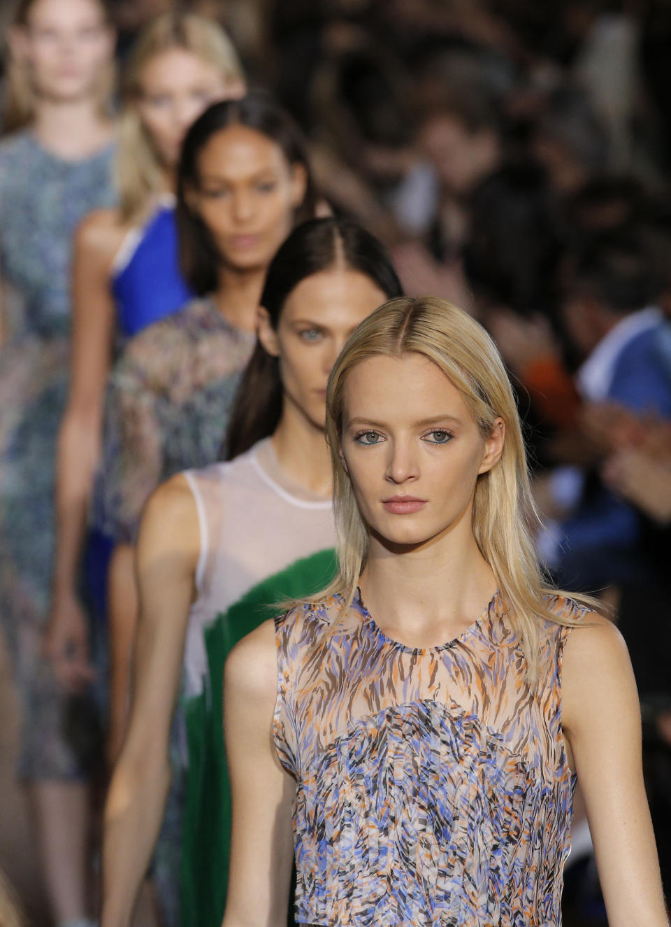 Models wear creations for British fashion designer Stella McCartney's ready to wear Spring-Summer 2013 collection, presented in Paris, Monday, Oct.1, 2012. (AP Photo/Francois Mori)