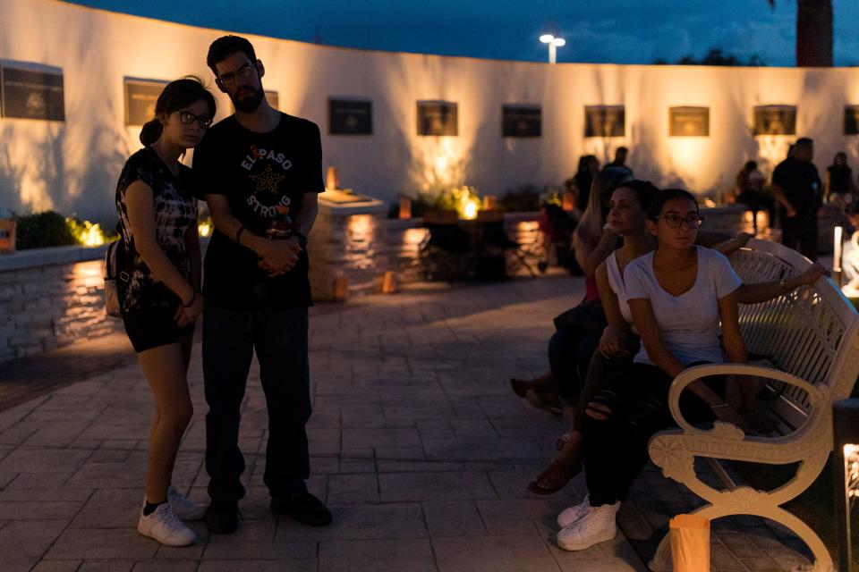 El Pasoans gather to honor the El Paso shooting victims on the third anniversary as luminarias are placed around the Healing Garden and Ascarate Park on Aug. 3, 2022.