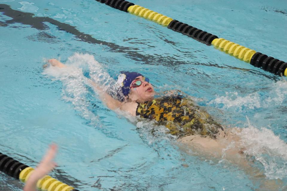 Madison Krah swims the backstroke during a meet this season for Hopewell Varsity Swimming.