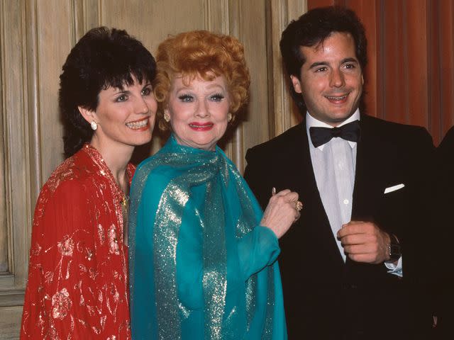 <p>Vinnie Zuffante/Getty</p> Lucie Arnaz, Lucille Ball and Desi Arnaz Jr. attend a tribute to Lucille Ball held at the Museum of Broadcasting in New York City in April 1984.