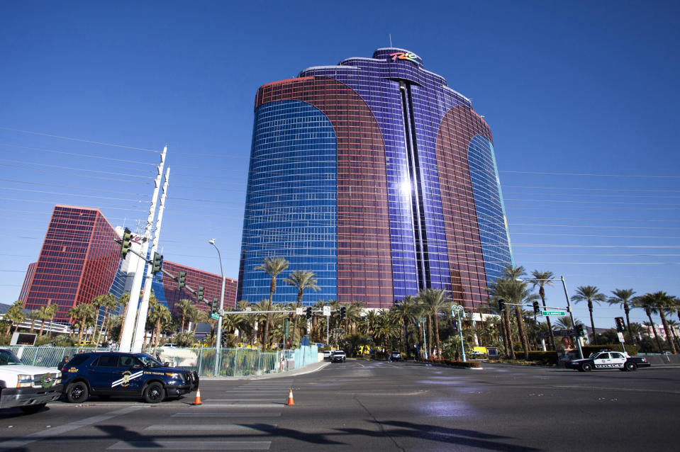 FILE - The Rio All-Suite Hotel & Casino in Las Vegas, Dec. 29, 2016. Jury selection is under way in the trial of Caleb Rogers, a Las Vegas police officer accused of stealing nearly $165,000 in a series of casino heists. Rogers made off with more than $85,000 in the first two robberies between November 2021 and January 2022 at casinos off the Las Vegas Strip while his police colleagues spent months trying to catch the thief. Rogers nearly bagged an additional $79,000 in a third robbery at the Rio All-Suite Hotel & Casino in February 2022, but security guards detained him outside following a brief struggle. (Yasmina Chavez/Las Vegas Sun via AP, File)