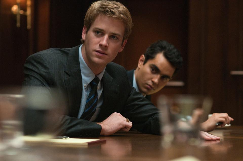 Tyler and Cameron Winklevoss (Armie Hammer) and Divya Narendra (Max Minghella) sue Mark Zuckerberg (Jesse Eisenberg) for theft of intellectual property.